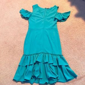 This Tome NYC dress is bright blue and perfect for any occasion!